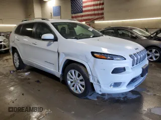 2018 Jeep Cherokee Overland z VIN 1C4PJMJX4JD614218, wystawiony jako Copart lot #69771824 z przebiegiem 59 695 mil mil oraz Szkoda całkowita • Salvage title. Historia ofert i sprzedaży dostępna na DreamBid. Obrazek 4.
