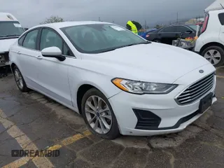 2020 Ford Fusion Hybrid SE with VIN 3FA6P0LU2LR253612, listed as a IAAI auction lot 41798850 with 58,219 mi miles. Bid and sale history available at carsss.com. Image 1.