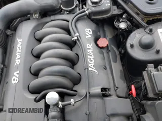 1997 Jaguar XK with VIN SAJGX274XVC017622, listed as a IAAI auction lot 41614339 with 94,298 mi miles and . Bid and sale history available at DreamBid. Image 10.