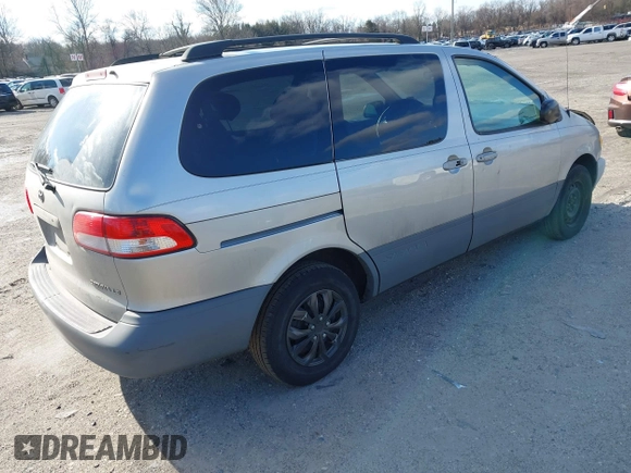 2002 Toyota Sienna LE with VIN 4T3ZF13C52U450825, listed as a IAAI auction lot 41604636 with 179,495 mi miles. Bid and sale history available at carsss.com. Image 4.