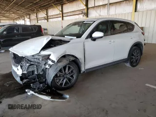 2018 Mazda CX-5 Grand Touring z VIN JM3KFADM9J1374426, wystawiony jako Copart lot #56930005 z przebiegiem 108 684 mil mil oraz Szkoda całkowita • Salvage title. Historia ofert i sprzedaży dostępna na DreamBid. Obrazek 1.
