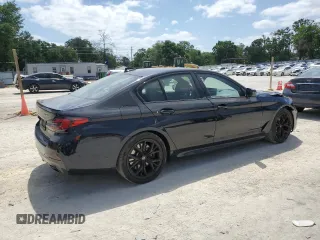 2023 BMW 5 Series 530i with VIN WBA53BH04PWY02486, listed as a Copart auction lot 54519385 with 26,979 mi miles and Salvage title. Bid and sale history available at DreamBid. Image 3.