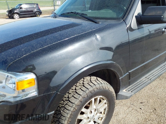 2012 Ford Expedition XLT with VIN 1FMJU1J51CEF40095, listed as a IAAI auction lot 41890811 with 202,090 mi miles and . Bid and sale history available at DreamBid. Image 6.