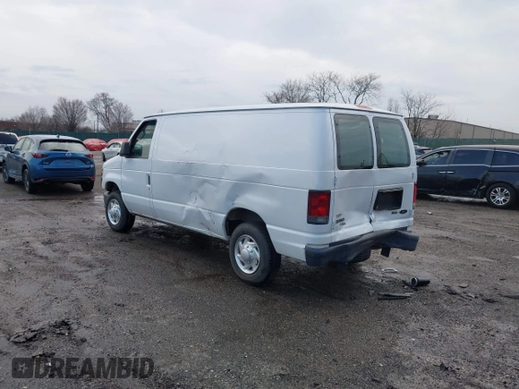 2013 Ford Econoline Cargo Commercial with VIN 1FTNE1EW2DDB11061, listed as a IAAI auction lot 41808318 with 230,677 mi miles. Bid and sale history available at carsss.com. Image 3.