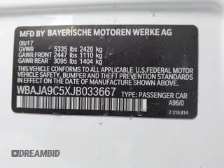 2018 BMW 5 Series 530e with VIN WBAJA9C5XJB033667, listed as a IAAI auction lot 42107936 with 55,753 mi miles and . Bid and sale history available at DreamBid. Image 9.