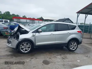 2013 Ford Escape SEL z VIN 1FMCU9H97DUA34665, wystawiony jako IAAI lot #42258567 z przebiegiem 174 227 mil mil oraz . Historia ofert i sprzedaży dostępna na DreamBid. Obrazek 14.