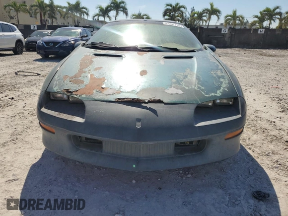 1997 Chevrolet Camaro Z28 z VIN 2G1FP22P0V2107947, wystawiony jako Copart lot #43237785 z przebiegiem Nie podano mil oraz Czysty tytuł • Clean title. Historia ofert i sprzedaży dostępna na DreamBid. Obrazek 5.