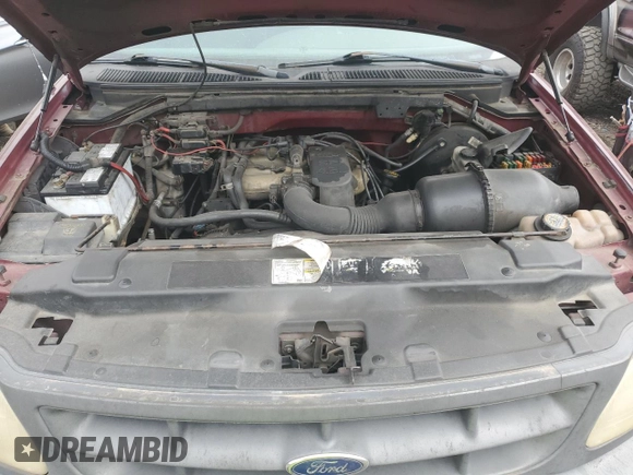 1998 Ford F-150 with VIN 1FTZX1727WNB55284, listed as a Copart auction lot 51781465 with 258,600 mi miles and Salvage title. Bid and sale history available at DreamBid. Image 11.