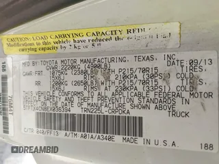 2014 Toyota Tacoma with VIN 5TFTX4CN8EX036394, listed as a IAAI auction lot 42306881 with 256,655 mi miles and . Bid and sale history available at DreamBid. Image 9.