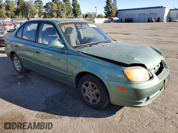 2003 Hyundai Accent GL with VIN KMHCG45C63U430403, listed as a Copart auction lot 86430724 with 74,200 mi miles and Salvage Title. Bid and sale history available at carsss.com. Image 4.