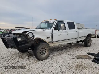 1994 Ford F-350 with VIN 1FTJW36K5REA11914, listed as a Copart auction lot 83251984 with 207,802 mi miles and Salvage title. Bid and sale history available at DreamBid. Image 1.