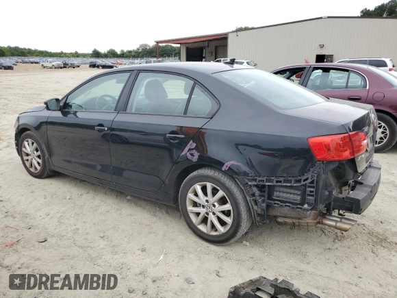 2012 Volkswagen Jetta SE with VIN 3VWDP7AJ3CM451497, listed as a Copart auction lot 58322715 with 180,266 mi miles and Salvage title. Bid and sale history available at DreamBid. Image 2.