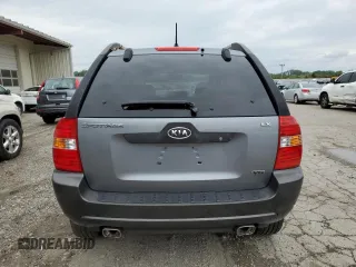 2005 Kia Sportage LX with VIN KNDJF723057062113, listed as a Copart auction lot 66630164 with 129,715 mi miles and Salvage Title. Bid and sale history available at carsss.com. Image 6.