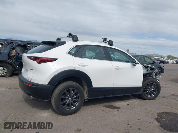 2021 Mazda CX-30 2.5 S with VIN 3MVDMAAL8MM226728, listed as a IAAI auction lot 41492548 with 56,826 mi miles. Bid and sale history available at carsss.com. Image 14.