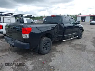 2011 Toyota Tundra 2WD Truck SR with VIN 5TFTY5F14BX007238, listed as a IAAI auction lot 41663289 with 126,499 mi miles. Bid and sale history available at carsss.com. Image 4.