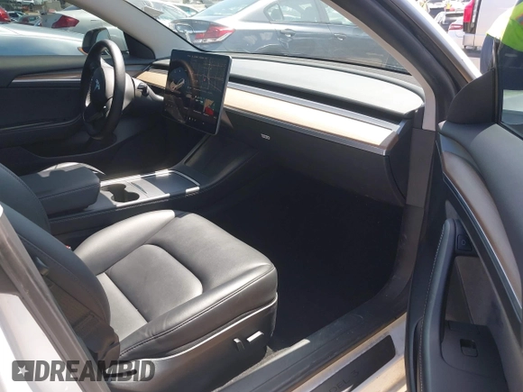 2022 Tesla Model 3 Long Range with VIN 5YJ3E1EB1NF289719, listed as a IAAI auction lot 41968273 with 73,368 mi miles and . Bid and sale history available at DreamBid. Image 5.