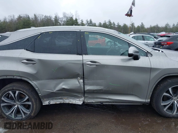 2017 Lexus RX 350 with VIN 2T2BZMCA1HC125449, listed as a IAAI auction lot 41966133 with 102,788 mi miles and . Bid and sale history available at DreamBid. Image 14.