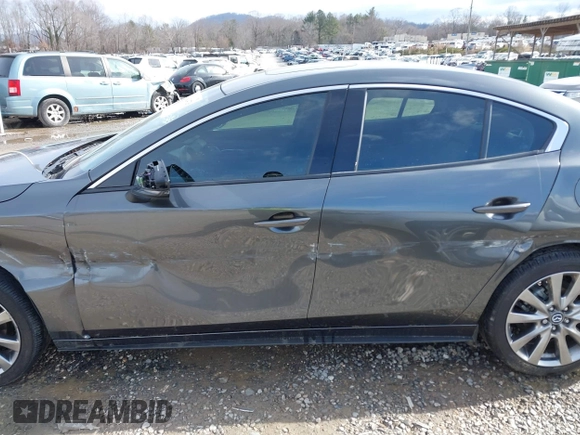 2023 Mazda 3 S Premium with VIN 3MZBPBDM8PM373434, listed as a IAAI auction lot 41234729 with 9,387 mi miles and . Bid and sale history available at DreamBid. Image 14.