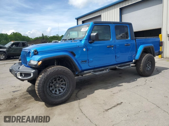 2021 Jeep Gladiator Freedom с VIN 1C6HJTAG7ML553303, выставлен на аукционе Copart как лот 57038585 с пробегом 49 400 миль миль и Списание • Salvage title. История ставок и продаж доступна на DreamBid. Изображение 1.