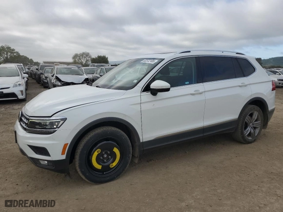2019 Volkswagen Tiguan SEL Premium with VIN 3VV4B7AX9KM156202, listed as a Copart auction lot 52372185 with 76,777 mi miles and Salvage Title. Bid and sale history available at carsss.com. Image 1.