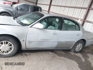 2003 Buick LeSabre Limited z VIN 1G4HR54K13U209094, wystawiony jako IAAI lot #42572460 z przebiegiem 102 970 mil mil oraz . Historia ofert i sprzedaży dostępna na DreamBid. Obrazek 14.