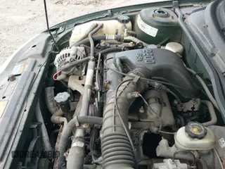 2000 Chevrolet Cavalier z VIN 1G1JC1244Y7306244, wystawiony jako IAAI lot #42021560 z przebiegiem 133 803 mil mil oraz . Historia ofert i sprzedaży dostępna na DreamBid. Obrazek 13.