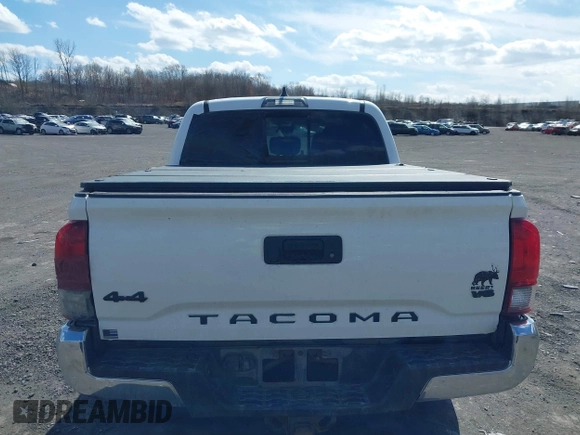 2020 Toyota Tacoma SR5 with VIN 3TMCZ5AN5LM339977, listed as a IAAI auction lot 41886937 with 94,986 mi miles and . Bid and sale history available at DreamBid. Image 16.