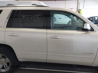 2015 Chevrolet Tahoe LTZ with VIN 1GNSKCKC9FR123996, listed as a IAAI auction lot 42113435 with 149,825 mi miles and . Bid and sale history available at DreamBid. Image 13.