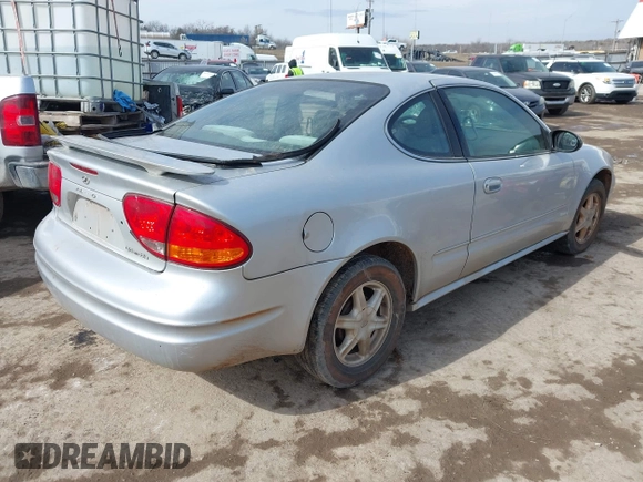 2003 Oldsmobile Alero GL1 z VIN 1G3NL12F53C266556, wystawiony jako IAAI lot #41561869 z przebiegiem 112 894 mil mil oraz . Historia ofert i sprzedaży dostępna na DreamBid. Obrazek 4.