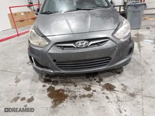2013 Hyundai Accent GL with VIN KMHCT5AEXDU100208, listed as a IAAI auction lot 41517792 with 164,510 mi miles. Bid and sale history available at carsss.com. Image 6.