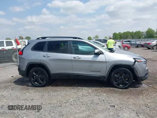 2016 Jeep Cherokee Latitude with VIN 1C4PJLCB3GW176901, listed as a IAAI auction lot 42019983 with 141,104 mi miles and . Bid and sale history available at DreamBid. Image 13.
