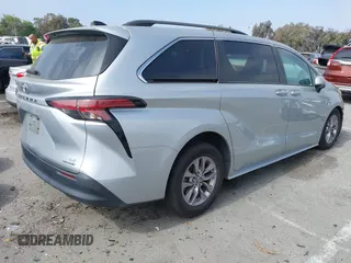 2021 Toyota Sienna LE with VIN 5TDKRKEC5MS010782, listed as a IAAI auction lot 42272827 with 196,844 mi miles and . Bid and sale history available at DreamBid. Image 4.