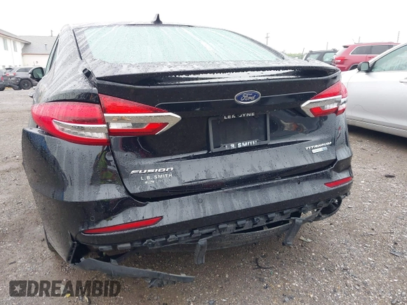 2019 Ford Fusion Titanium with VIN 3FA6P0D92KR125864, listed as a IAAI auction lot 42425422 with 109,340 mi miles and . Bid and sale history available at DreamBid. Image 6.