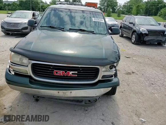 2002 GMC Yukon SLE z VIN 1GKEC13Z22R152796, wystawiony jako Copart lot #55330344 z przebiegiem 337 318 mil mil oraz Szkoda całkowita • Salvage title. Historia ofert i sprzedaży dostępna na DreamBid. Obrazek 11.