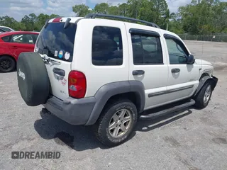 2004 Jeep Liberty Sport with VIN 1J4GK48K54W153217, listed as a IAAI auction lot 42071897 with 106,921 mi miles and . Bid and sale history available at carsss.com. Image 4.