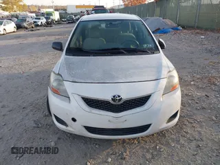 2010 Toyota Yaris with VIN JTDBT4K33A1394734, listed as a IAAI auction lot 40704798 with 156,032 mi miles. Bid and sale history available at carsss.com. Image 6.
