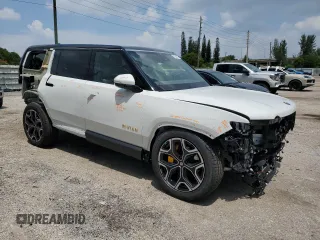 2023 Rivian R1S Adventure z VIN 7PDSGABA7PN021756, wystawiony jako Copart lot #67650414 z przebiegiem 3284 mil mil oraz Szkody całkowita. Historia ofert i sprzedaży dostępna na DreamBid. Obrazek 4.