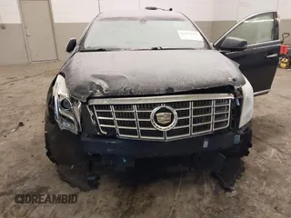 2013 Cadillac XTS Luxury with VIN 2G61P5S34D9200849, listed as a IAAI auction lot 41412189 with 134,932 mi miles. Bid and sale history available at carsss.com. Image 6.