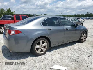 2009 Acura TSX z VIN JH4CU26699C031458, wystawiony jako Copart lot #60595125 z przebiegiem 188 954 mil mil oraz Czysty tytuł • Clean title. Historia ofert i sprzedaży dostępna na DreamBid. Obrazek 3.