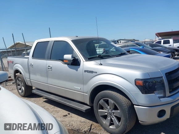 2014 Ford F-150 XL with VIN 1FTFW1CT5EKE30719, listed as a IAAI auction lot 42024407 with 215,004 mi miles and . Bid and sale history available at DreamBid. Image 14.