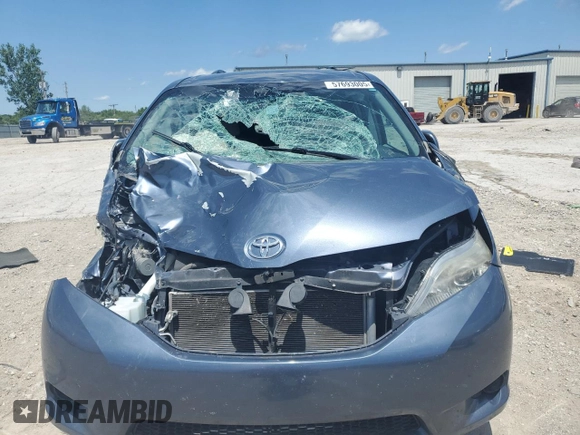 2015 Toyota Sienna LE with VIN 5TDJK3DC4FS107711, listed as a Copart auction lot 57693005 with 141,370 mi miles and Salvage title. Bid and sale history available at DreamBid. Image 5.
