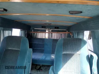 1994 Chevrolet Chevy Van z VIN 1GBEG25K1RF118547, wystawiony jako Copart lot #74319254 z przebiegiem 179 866 mil mil oraz Czysty tytuł • Clean title. Historia ofert i sprzedaży dostępna na DreamBid. Obrazek 10.