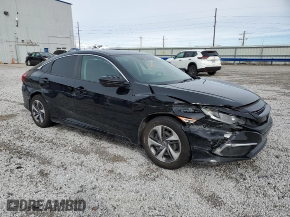 2019 Honda Civic LX with VIN 19XFC2F61KE009602, listed as a Copart auction lot 45585045 with 84,414 mi miles and Salvage Title. Bid and sale history available at DreamBid. Image 4.