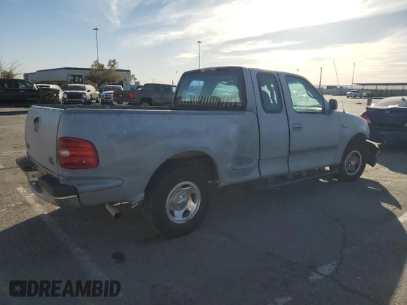 2000 Ford F-150 XL with VIN 1FTZX0723YKA02769, listed as a Copart auction lot 78722714 with 354,312 mi miles and Salvage title. Bid and sale history available at DreamBid. Image 3.