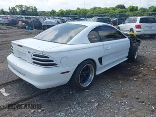 1994 Ford Mustang GT z VIN 1FALP42T0RF155834, wystawiony jako IAAI lot #42698515 z przebiegiem 146 338 mil mil oraz . Historia ofert i sprzedaży dostępna na DreamBid. Obrazek 4.