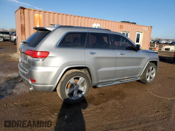 2015 Jeep Grand Cherokee Overland with VIN 1C4RJFCT8FC619014, listed as a Copart auction lot 44304375 with 123,767 mi miles and Salvage Title. Bid and sale history available at carsss.com. Image 3.