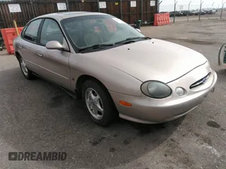 1999 Ford Taurus SE with VIN 1FAFP53S9XA330603, listed as a IAAI auction lot 41819819 with 207,025 mi miles. Bid and sale history available at carsss.com. Image 1.