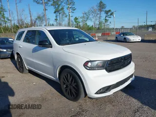 2015 Dodge Durango R/T with VIN 1C4SDHCT7FC873768, listed as a IAAI auction lot 41814710 with 130,237 mi miles and . Bid and sale history available at carsss.com. Image 1.
