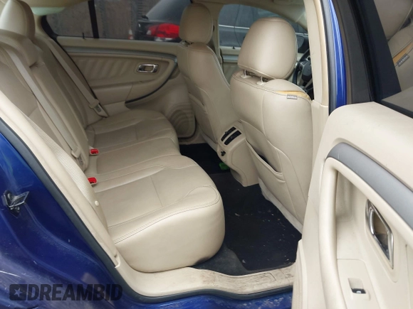2014 Ford Taurus SEL with VIN 1FAHP2E80EG106719, listed as a IAAI auction lot 41967594 with 194,426 mi miles and . Bid and sale history available at DreamBid. Image 8.