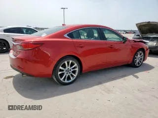 2014 Mazda 6 i Grand Touring с VIN JM1GJ1W61E1137267, выставлен на аукционе Copart как лот 57243225 с пробегом 51 939 миль миль и Списание • Salvage title. История ставок и продаж доступна на DreamBid. Изображение 3.